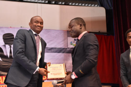 Oluwakayode Adigun receives his award at TAS 2.0